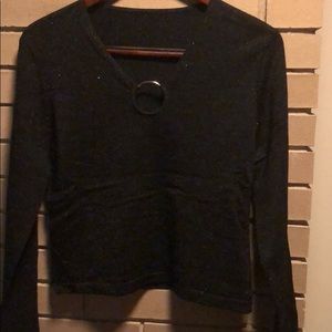 Sparkly black knit top.